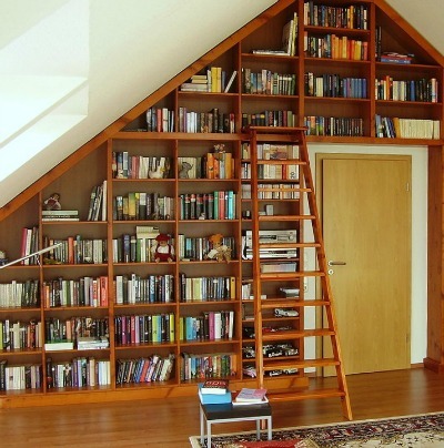Small Apartment Ideas: Use Floor to Ceiling Bookcases