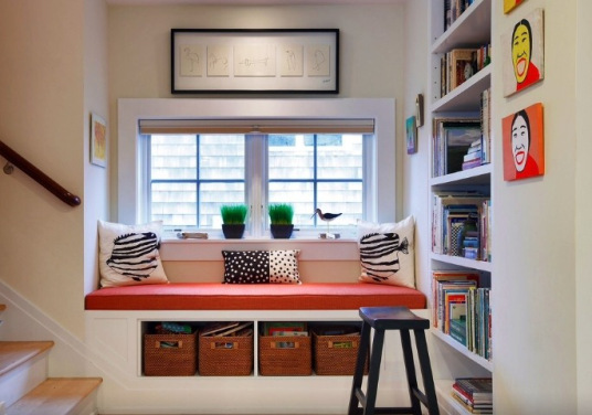 A stair landing becomes a mini-library.