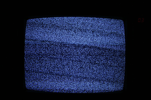 Scary TV shows on mute add to NYC Halloween party ambiance