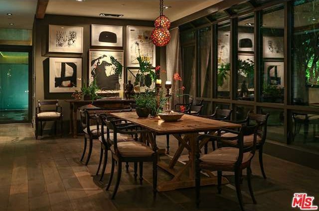 This rustic dining area brings together farm to table inspiration with Parisian bistro design, making a dramatic impact. Were sure the menus presented in this Malibu, CA abode listed by Ellen Francisco with Coldwell Banker Residential Brokerage are truly divine.