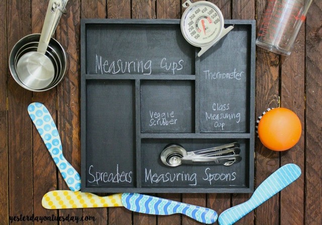 Keep utensils in a chalkboard divider