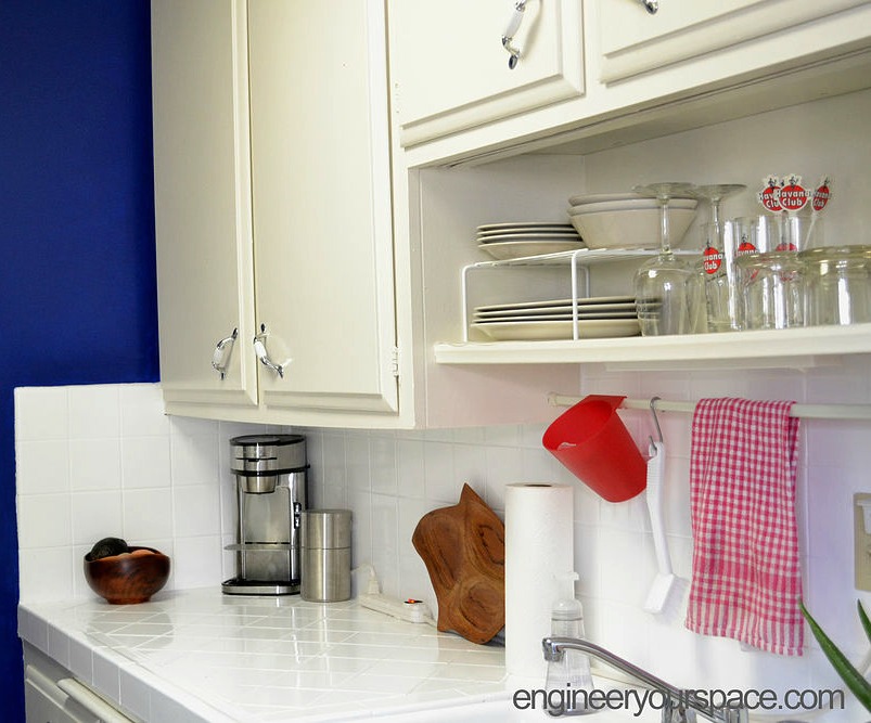 tension rod above sink