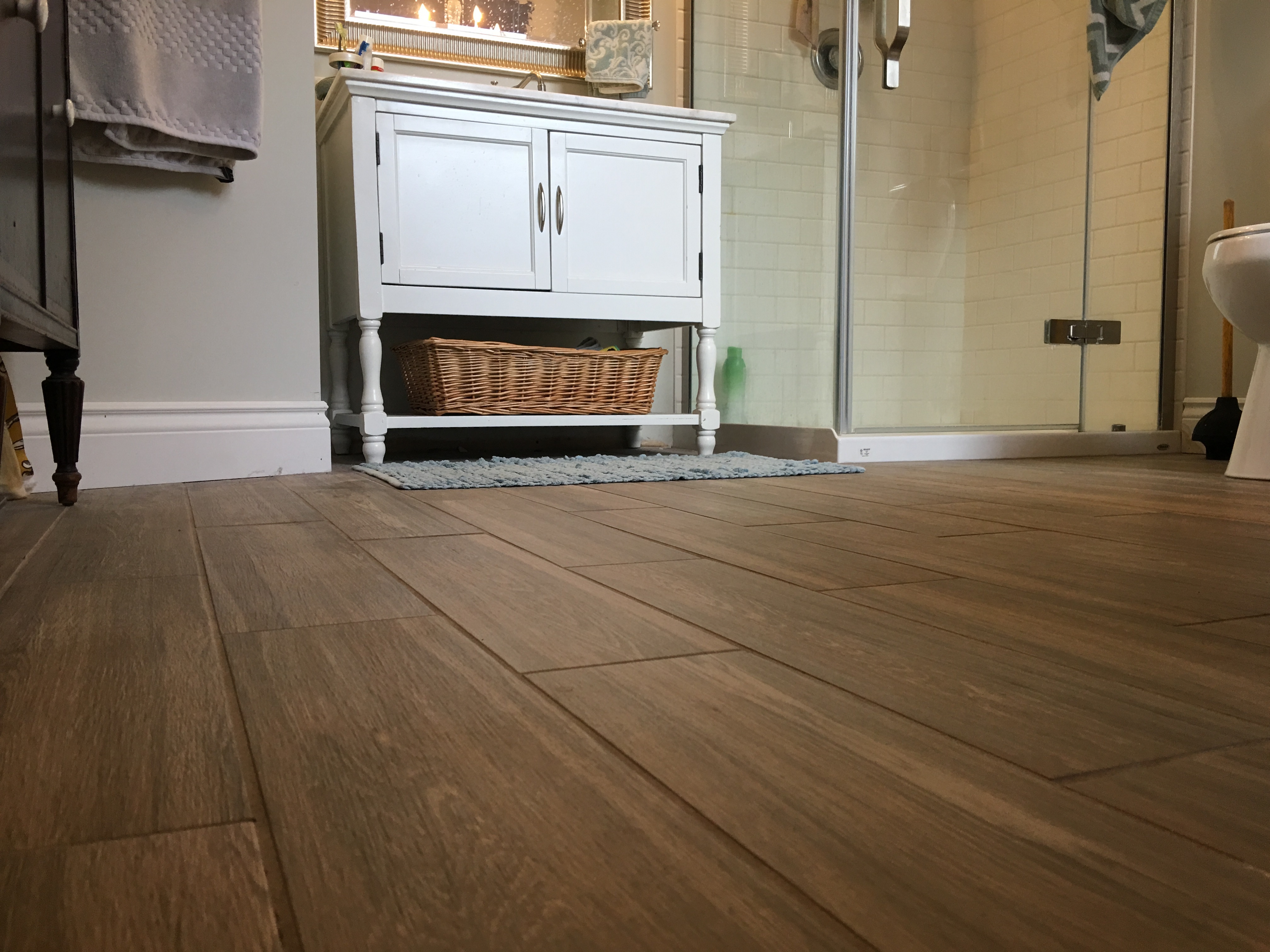 Beautiful bathroom with wood-look floor