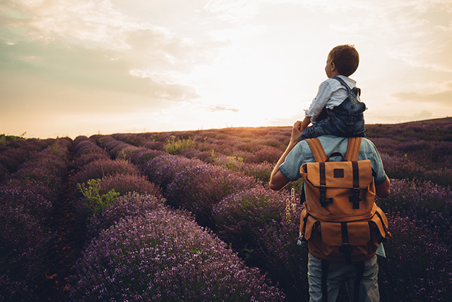 Photo of father and his son at the lavender field