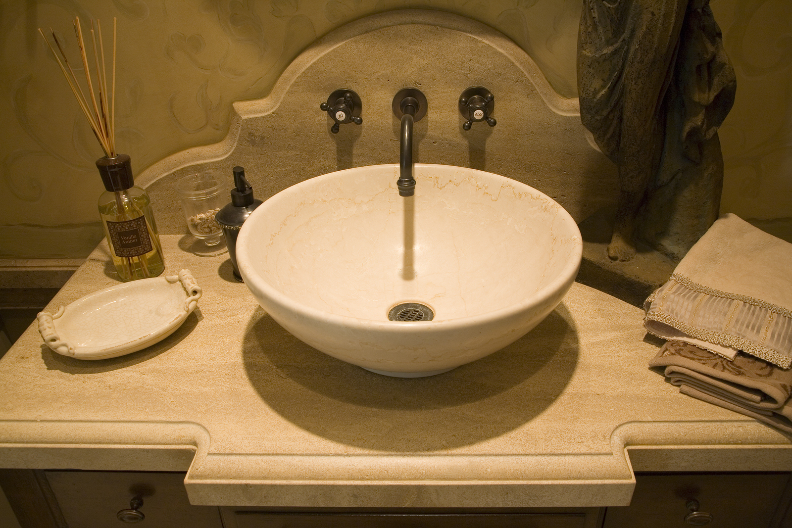 Modern bathroom with a luxurious sink and faucet.