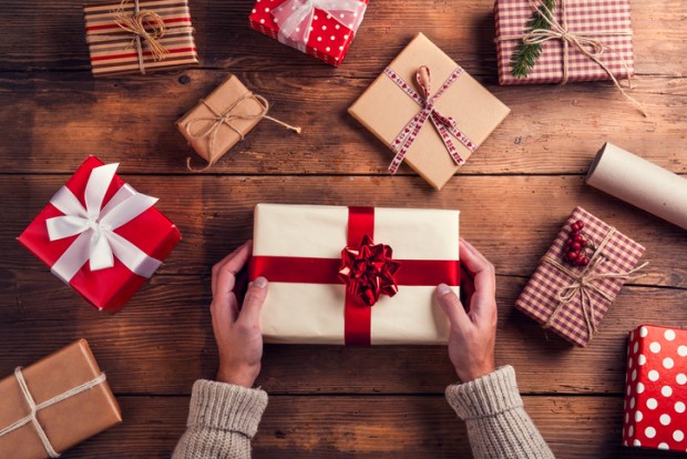 Man holding Christmas present