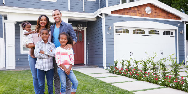 04.04 Increasing Curb Appeal - family infront of a house