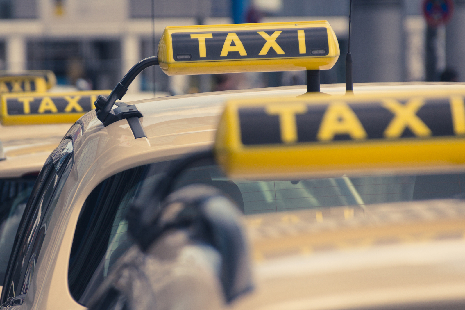 taxi cars waiting in line - taxi signs in queue